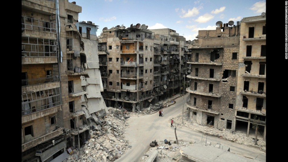 Apartments and other buildings lie in ruins on Tuesday, June 3, in &lt;a href=&quot;http://www.cnn.com/2014/06/09/world/meast/syria-aleppo-reporters-notebook/&quot;&gt;Aleppo, a city that &quot;has had the life bombed out of it,&quot;&lt;/a&gt; according to CNN&#39;s Nick Paton Walsh.