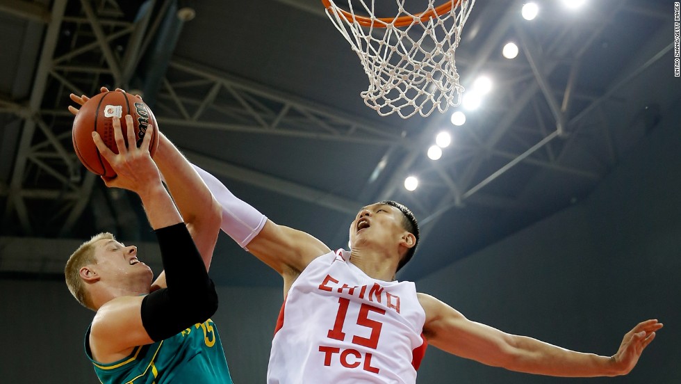 Luke Nevill of Australia, left, drives to the basket against Xu Zhonghao of China during a game between the two countries&#39; national teams Friday, June 6, in Zhenjiang, China. The two teams just completed a four-game series, with each team winning twice.