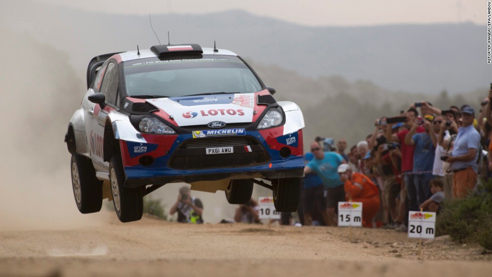 Robert Kubica&#39;s Ford Fiesta RS catches some air Friday, June 6, on day two of the Rally Italia Sardegna, the Italian event of the World Rally Championship. Kubica finished eighth in the race, which was won by Volkswagen&#39;s Sebastien Ogier.