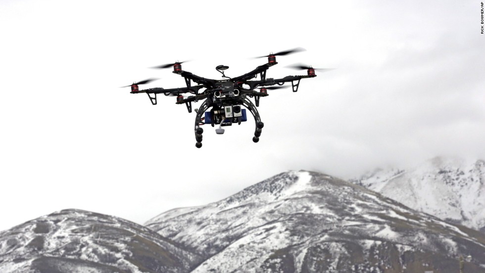Members of the Box Elder County Sheriff&#39;s Office fly their search-and-rescue drone during a demonstration in Brigham City, Utah, on February 13, 2014. Gov. Gary Hebert has approved the state&#39;s first drone restrictions, setting new limits on law enforcement&#39;s use of the technology. 