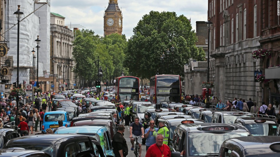 Taxi drivers gridlock European cities to protest Uber cab app - CNN