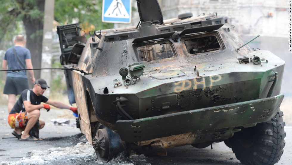 A military vehicle was destroyed during a clash between Ukrainian troops and pro-Russian separatists Friday, June 13, in Mariupol, Ukraine. 