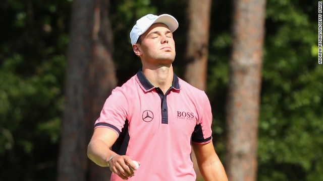Martin Kaymer had to battle in his third round but still held a five-shot lead at the U.S. Open.