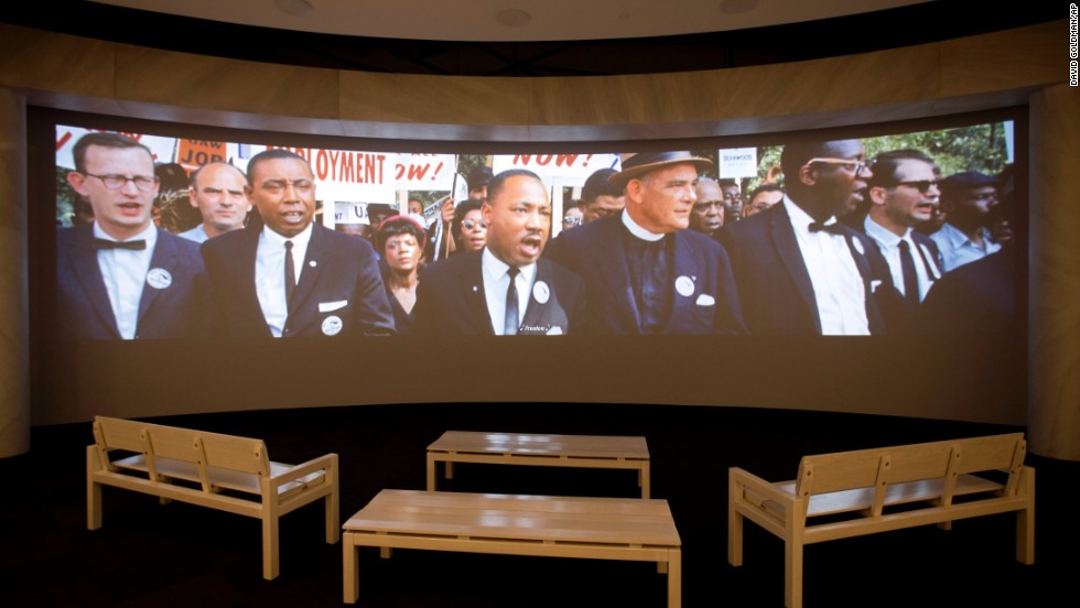 A movie plays as part of the March on Washington exhibit. &lt;a href=&quot;http://www.cnn.com/2013/08/23/us/gallery/color-march-on-washington/index.html&quot;&gt;See more photos from the 1963 rally&lt;/a&gt;, where the Rev. Martin Luther King Jr. delivered his historic &quot;I Have a Dream&quot; speech.