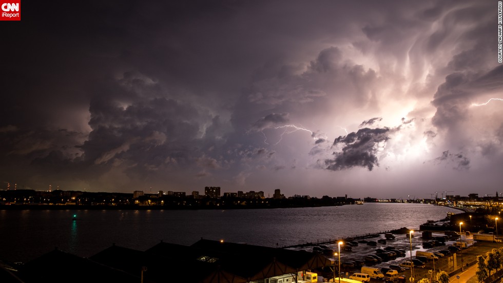 In Antwerp, Belgium, &lt;a href=&quot;http://ireport.cnn.com/docs/DOC-1145336&quot;&gt;Zachary Koulermos&lt;/a&gt; was woken up by a hailstorm in June. After the hail subsided, the rain brought an &quot;amazing lightning storm,&quot; he said. He grabbed his camera and tripod as the clouds retreated.