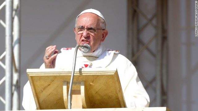  Pope Francis holds his omelia as he attends a mass during the feast-day Mass of Corpus Domini on the plains of the small town of Sibari on June 21, 2014 in Sibari Cosenza, Italy. Pope Francis concluded his one-day trip to the southern Italian region of Calabria with strong words against the Calabrian mafia, calling it &#39;adoration of evil and contempt for the common good, mafiosi are excommunicated, not in communion with God.&#39;