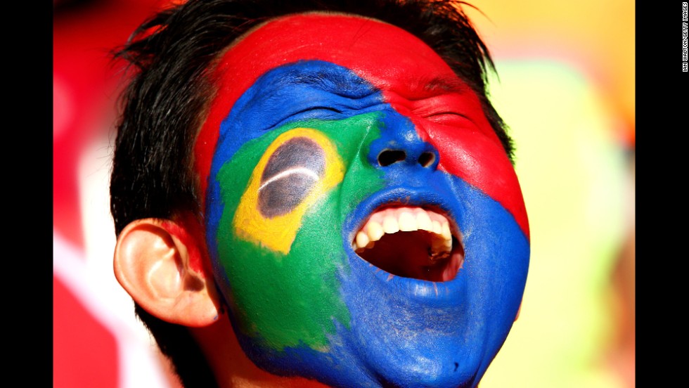 A South Korea fan cheers shows his support.