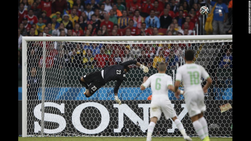 Algeria&#39;s goalkeeper Rais M&#39;bohli makes a save.