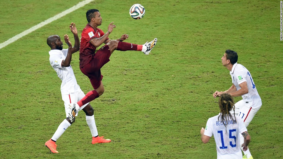 Portugal forward Nani jumps for the ball.