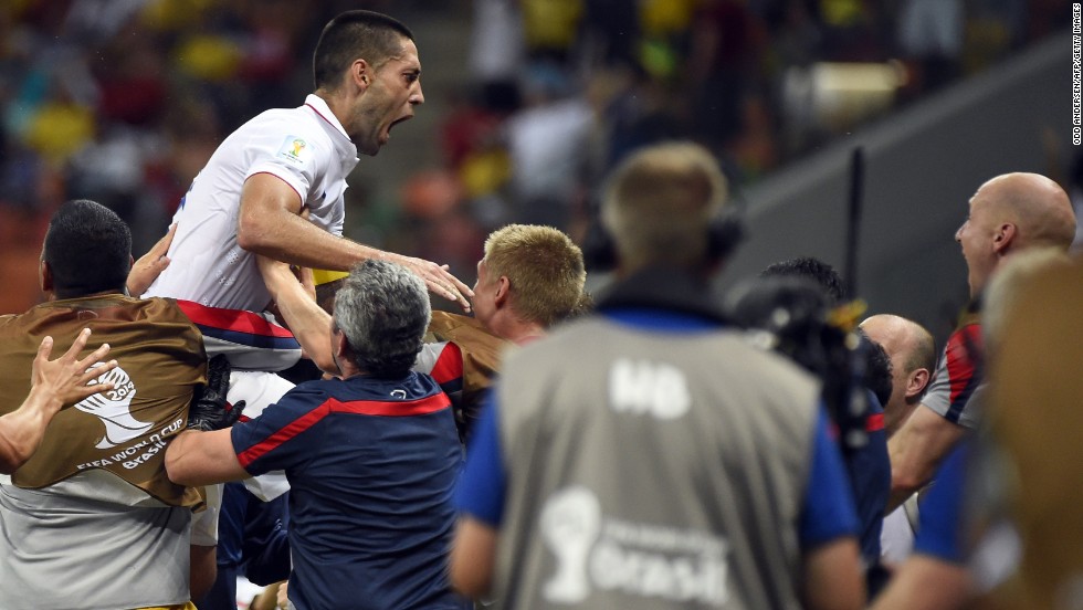 United States forward Clint Dempsey celebrates after scoring his team&#39;s second goal. The goal gave the United States a 2-1 lead, but Portugal stormed back to tie the crucial Group G match.