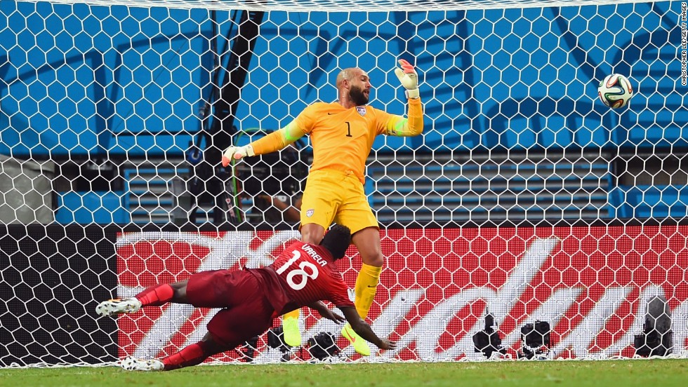 Talk about down to the wire. Silvestre Varela of Portugal scores his team&#39;s second goal past United States goalkeeper Tim Howard during a World Cup game at Arena Amazonia in Manaus, Brazil, on Sunday, June 22. The goal, scored with less than one minute left to play, led to a 2-2 draw.