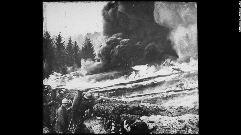 French soldiers making a gas and flame attack on German trenches in Flanders, Belgium, in 1918. German forces were the first to open valves on gas cylinders, releasing the toxic cloud on unprepared French troops in Ypres in 1915.