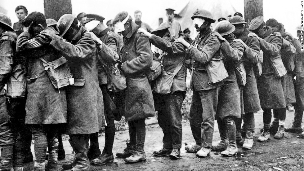 Men of the British Army&#39;s 55th Division, blinded by a poison gas attack, in April 1918. British soldier Wilfred Owen captured the panic of an attack in verse &quot;Gas! Gas! Quick, boys! -- An ecstasy of fumbling, Fitting the clumsy helmets just in time; But someone still was yelling out and stumbling, And flound&#39;ring like a man on fire or lime.&quot;