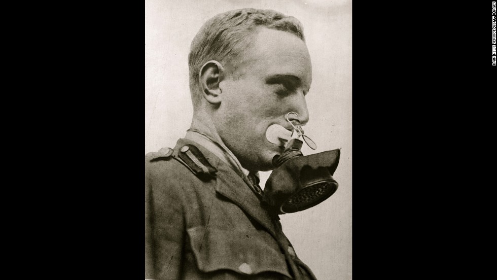 Early gas masks were often ineffectual. The Germans and Americans would ultimately be the most successful in creating barriers to lethal gases. A German soldier shows how to wear one version.