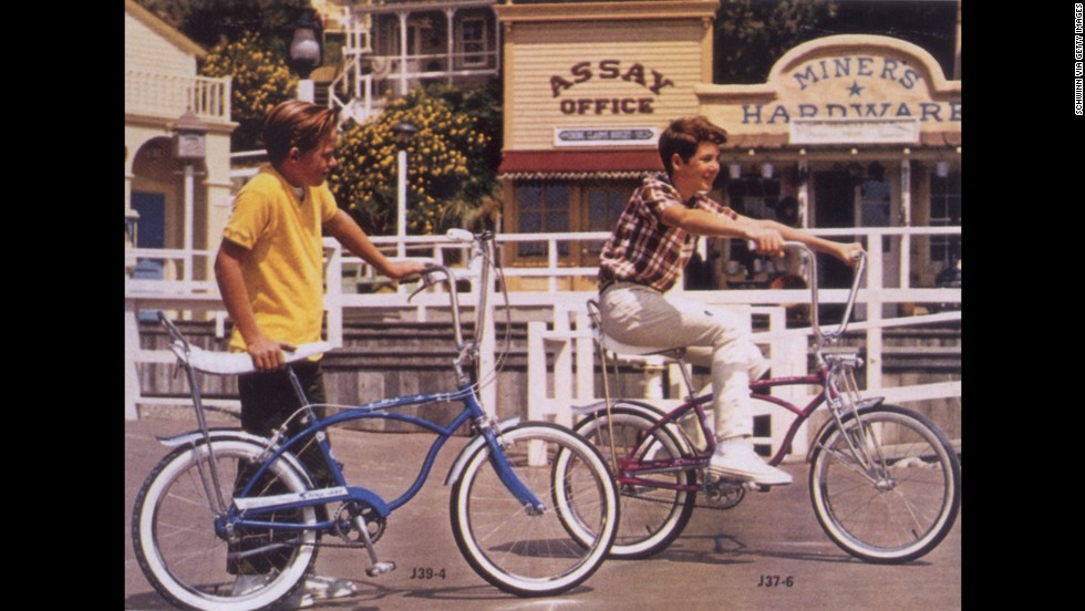 The Schwinn Sting-Ray, a motorcycle-inspired bicycle, debuted in 1963 and first appeared in Schwinn&#39;s catalog in 1964. Its banana seat and deep handlebars, shown here in 1966, became a fast favorite among young cyclists.