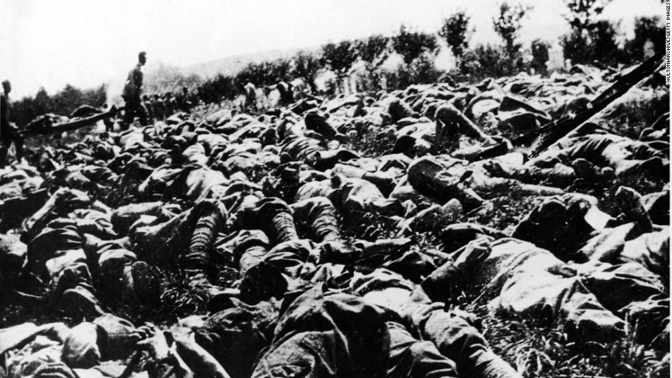 The bodies of hundreds of Italian soldiers are strewn across the battlefield, victims of a gas and flame attack during World War I, as others haul the wounded on stretchers. They were members of the Ninth Italian Regiment of the Queen&#39;s Brigade.