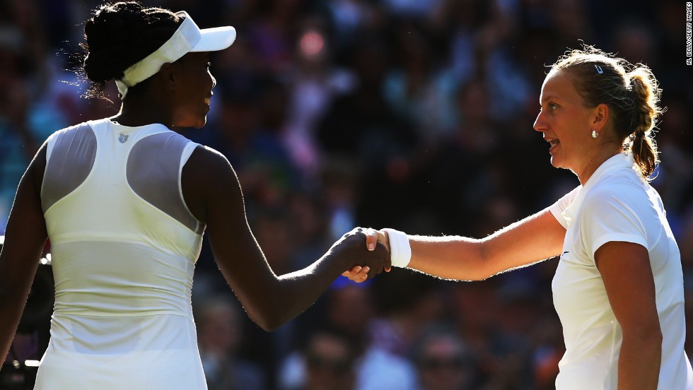 Venus Williams shakes hands with Petra Kvitova after going out in a three-set thriller on Centre Court.