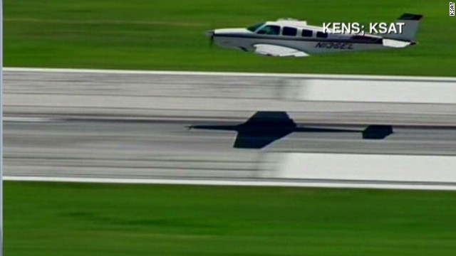 Plane's Emergency Landing Without Gear - CNN Video