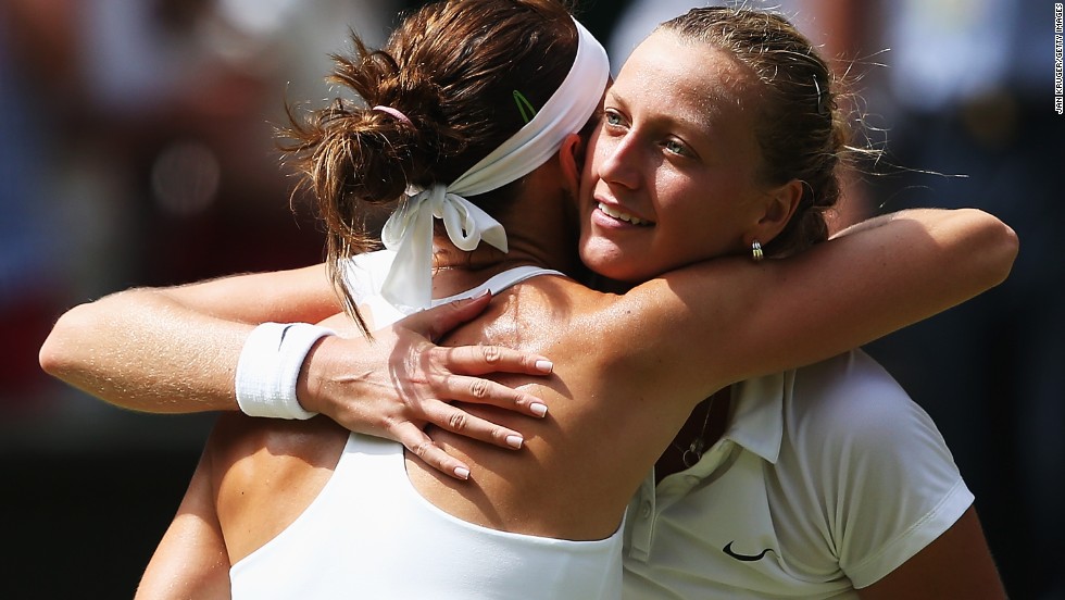 Kvitova and Safarova embrace at the end of their match.