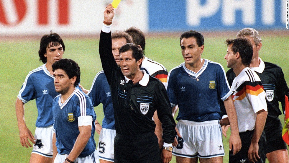 Mexican referee Ernesto Codesal Mendez gives a yellow card to  Maradona in the 1990 World Cup final between Argentina and West Germany, who won the game 1-0.