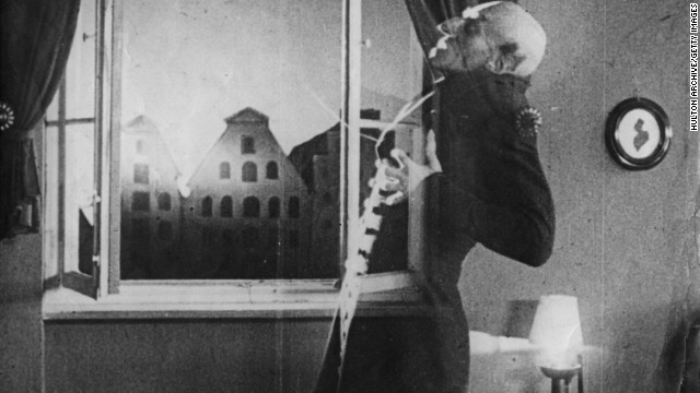 German actor Max Schreck (1879 - 1936), as the vampire Count Orlok, being destroyed by sunlight, in a still from F. W. Murnau&#39;s expressionist horror film, &#39;Nosferatu, Eine Symphonie Des Grauens&#39;, 1921. 