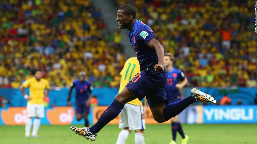 Georginio Wijnaldum of the Netherlands celebrates scoring his team&#39;s third goal during the third-place playoff match against Brazil on Saturday, July 12, in Brasilia, Brazil. The Netherlands defeated Brazil 3-0. 