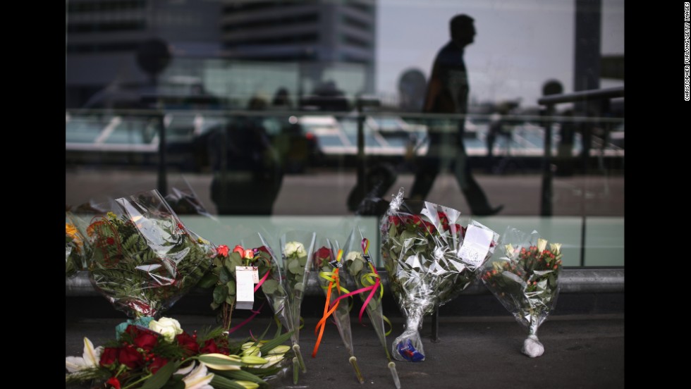 Floral tributes adorn the entrance to Schiphol Airport in Amsterdam.