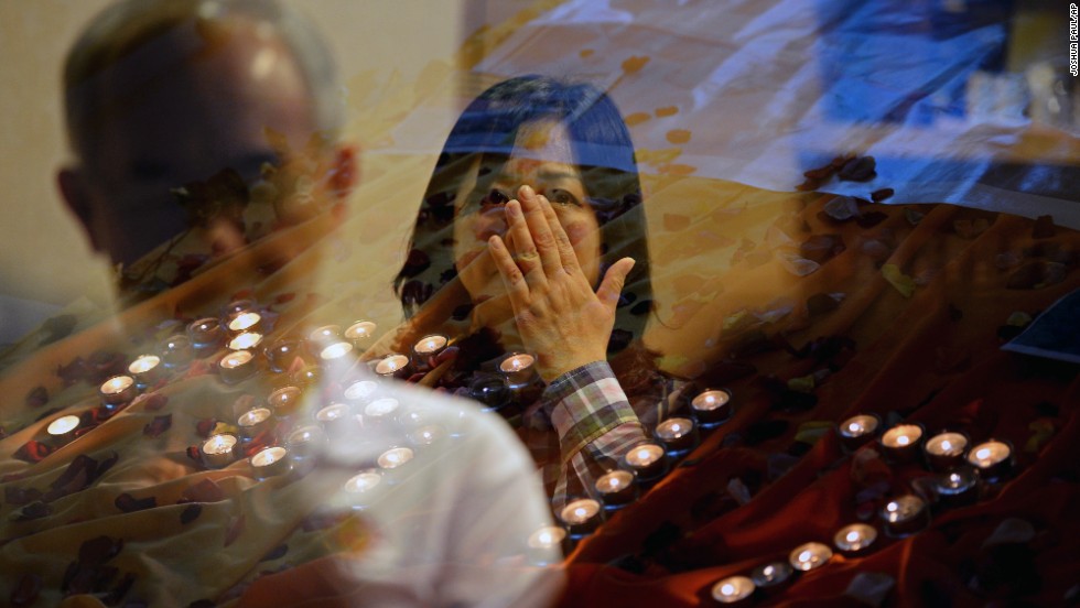 People pray for the victims of &lt;a href=&quot;http://www.cnn.com/specials/world/mh17-specials-page/index.html&quot; target=&quot;_blank&quot;&gt;Malaysia Airlines Flight 17&lt;/a&gt; at a church outside Kuala Lumpur on July 18. 