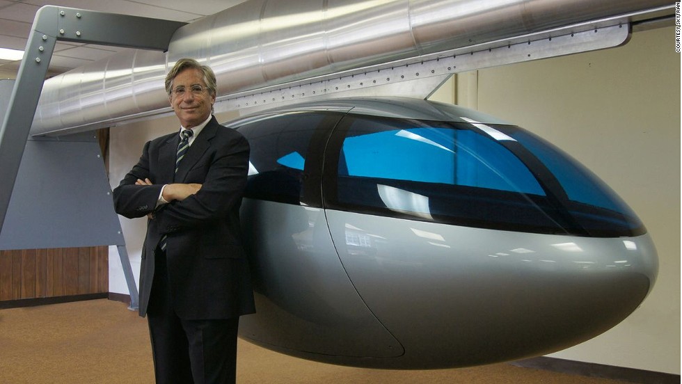 SkyTran CEO Jerry Sanders with a model pod. &quot;Being stuck in traffic is just the most stress-inducing, soul-crushing part of society today,&quot; says Sanders. &quot;We really want to make people&#39;s lives better and elevated, high-speed transportation is the answer.&quot;