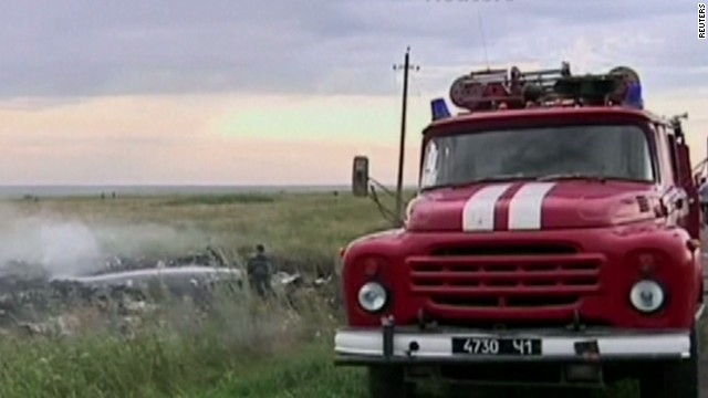 Confusion, hostility at MH17 crash site