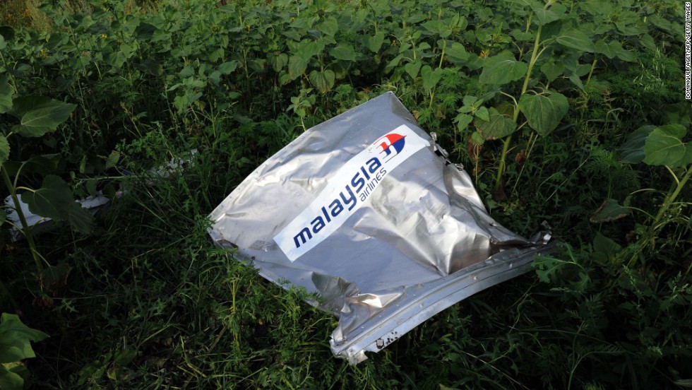 An envelope bearing the Malaysia Airlines logo is seen at the crash site on July 19, 2014. 