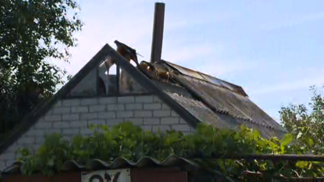 MH17 body fell through family&#39;s roof