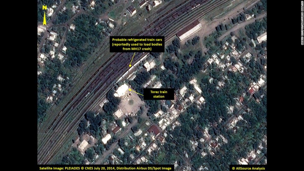 Refrigerated train cars are visible in this satellite image. Search teams have recovered 272 bodies, 251 of which have been loaded on trains with refrigerators, Ukrainian Prime Minister Arseniy Yatsenyuk said.