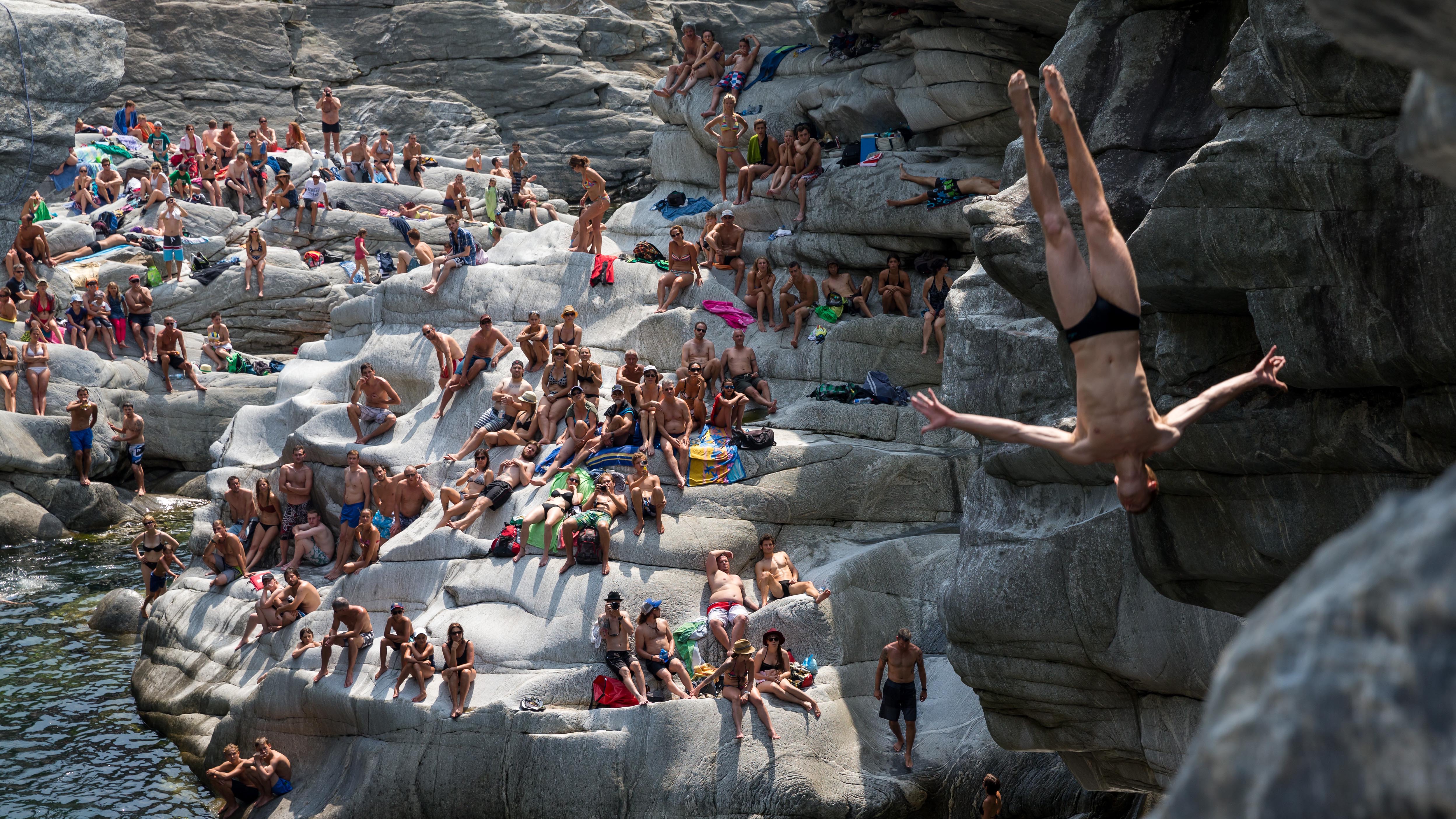 Amazing naked nudist females voyeured beach fan photo