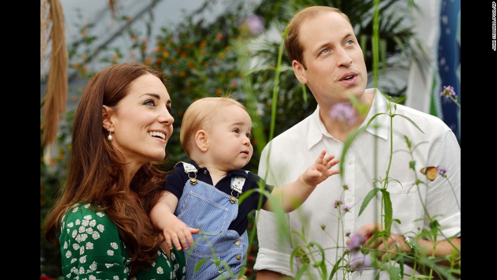 Britain&#39;s Prince George and his parents, Prince William and Duchess Catherine, visit a butterfly exhibition at London&#39;s Natural History Museum on July 2. Prince George celebrates his first birthday on Tuesday, July 22.