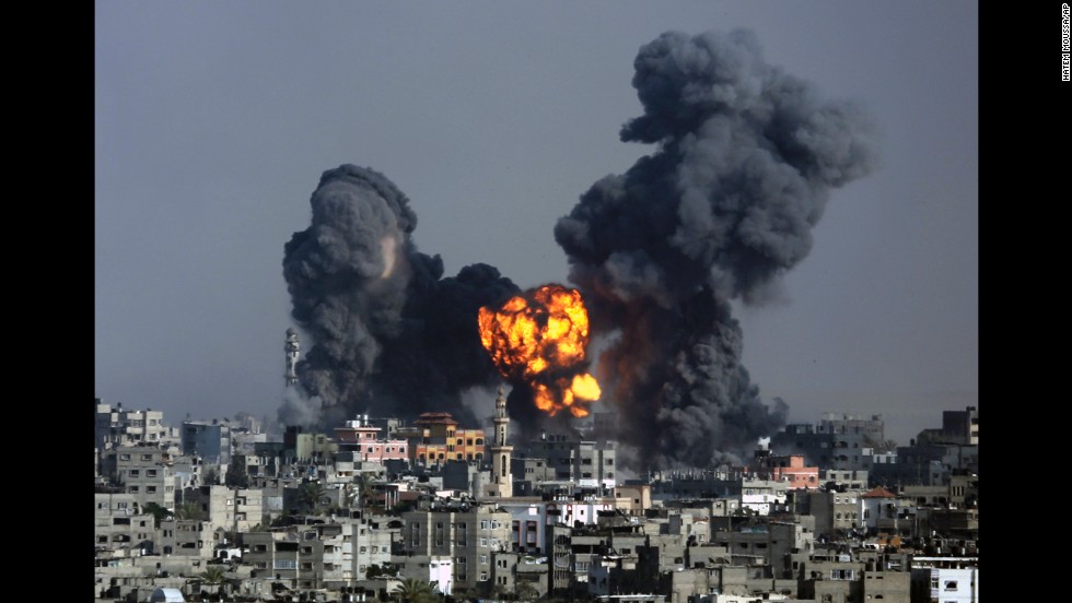 Smoke and fire from the explosion of an Israeli strike rise over Gaza City on July 22. 