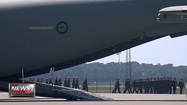 First MH17 bodies arrive in Netherlands 