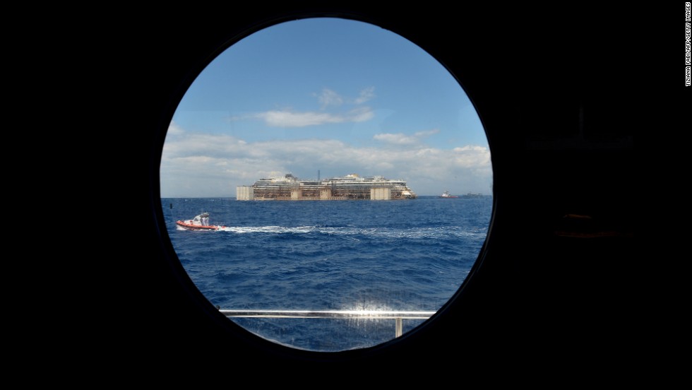 A view from a porthole shows the wreck of the Costa Concordia as it&#39;s being towed on July 23. It&#39;ll take about two years to dismantle the massive cruise liner.&lt;br /&gt;