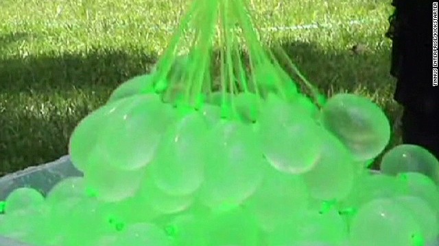 Fill 100 water balloons in a minute - CNN Video