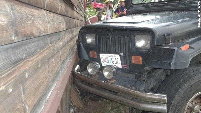 A 3-year-old crashed a Jeep into a home in Myrtle Creek, Oregon July 22, 2014.