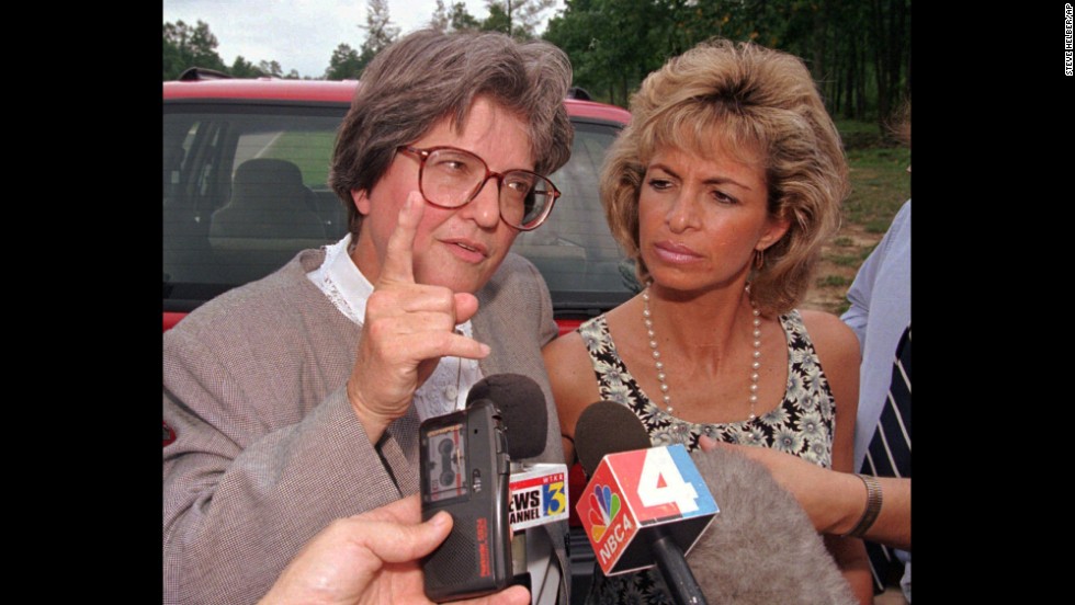 Prejean speaks to the media after Lori Urs, right, married Joseph O&#39;Dell just hours before his execution in Virginia in 1997. Prejean believes O&#39;Dell was innocent, too.