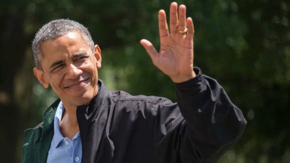 President Barack Obama waves as he returns to the White House where he kicked off his 52nd birthday weekend.   