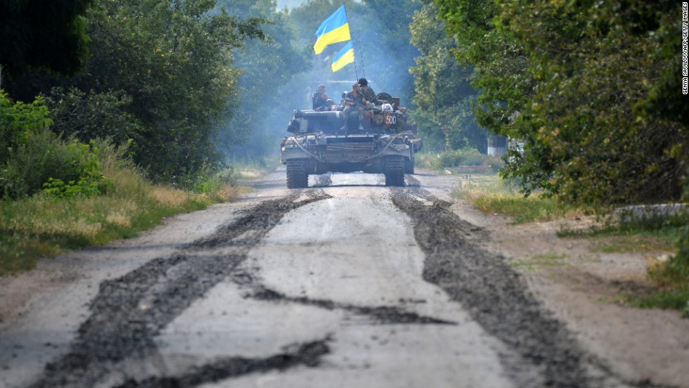 Ukrainian troops patrol near the village of Novoselovka on Thursday, July 31.