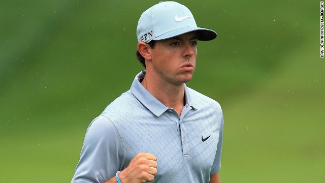 PGA: Rory roars, Tiger crashes out