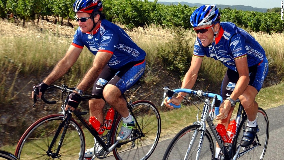 U.S. Postal Service team rider Lance Armstrong rides with Williams during training on a rest day of the 89th Tour de France cycling race in Vaison La Romaine on July 22, 2002.