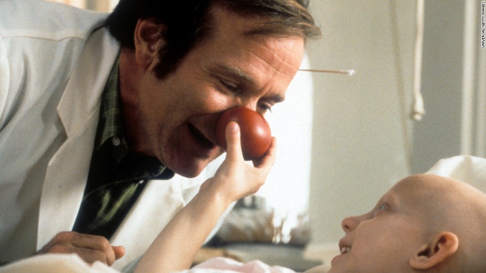 Williams visits a sick child in a scene from the film &quot;Patch Adams&quot; in 1998.