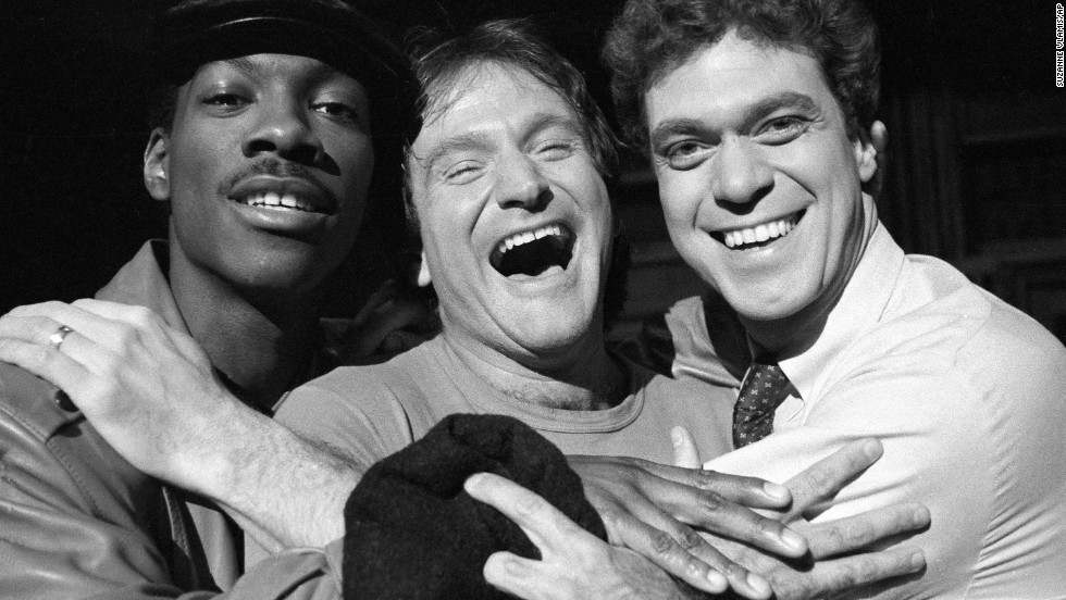 Williams, center, takes time out from rehearsal at NBC&#39;s &quot;Saturday Night Live&quot; with cast members Eddie Murphy, left, and Joe Piscopo on February 10, 1984. Williams would appear as guest host on the show.