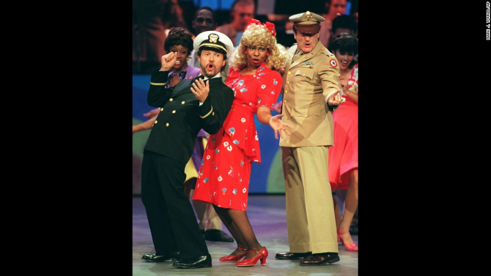 Comedians and co-hosts, from left, Billy Crystal, Whoopi Goldberg and Williams sing and dance the 1940s-era opening number to &quot;Comic Relief VII&quot; on November 11, 1995, in Los Angeles. 