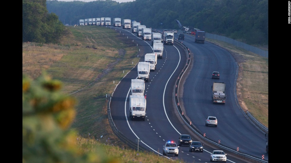 A convoy of trucks, which Moscow said was carrying relief goods for war-weary civilians, moves from Voronezh, Russia, toward Rostov-on-Don, Russia, on August 14.