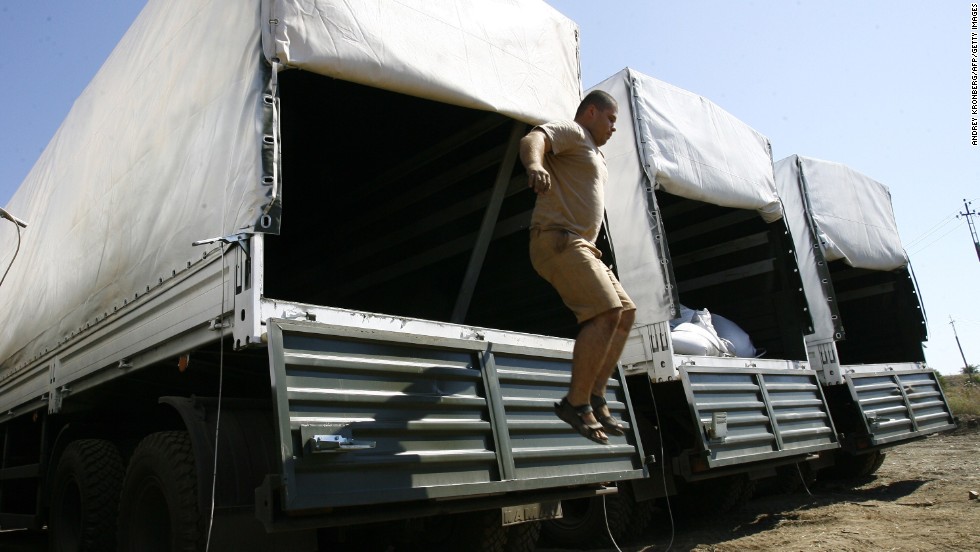 A truck driver from the convoy jumps out of a trailer on August 15. The Ukrainian government had expressed fears that the convoy was a large-scale effort to smuggle supplies or troops to pro-Russian rebels.